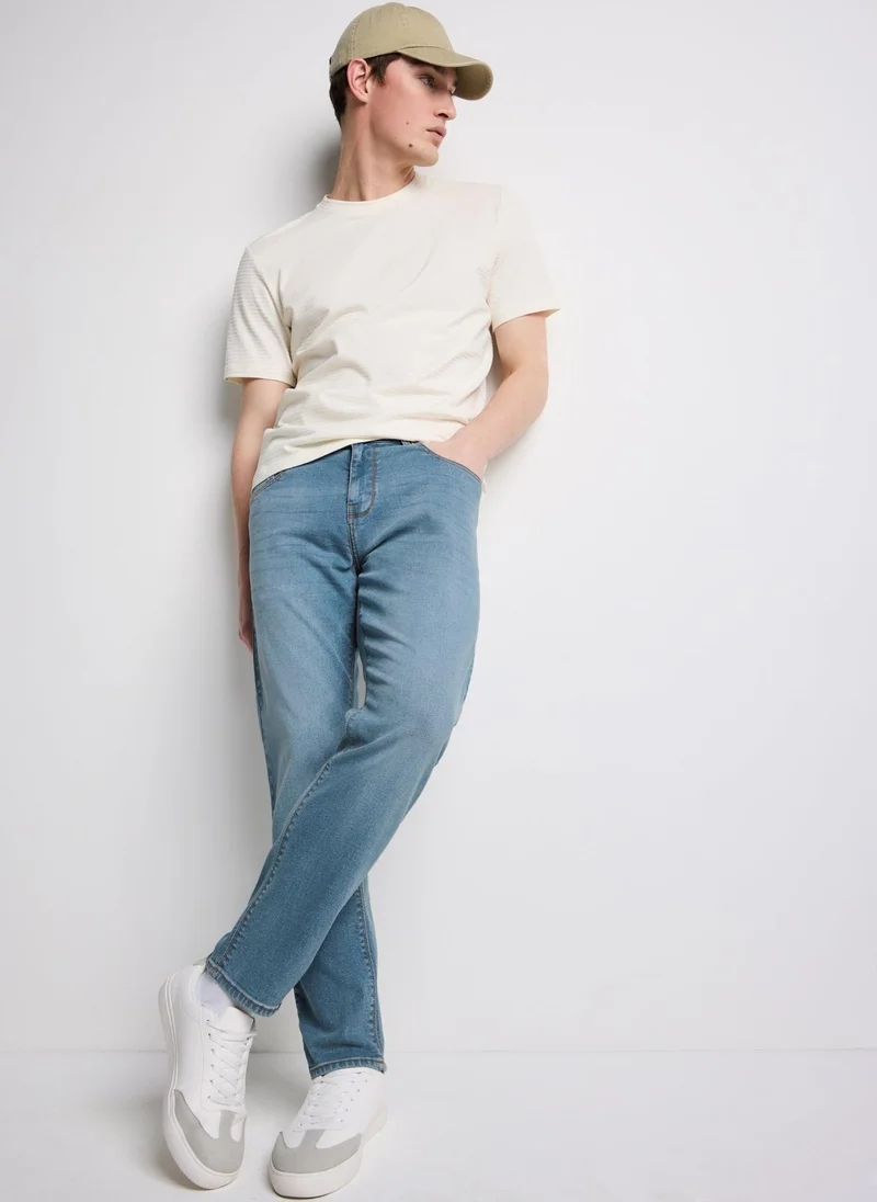 ماتلان Mid Wash Tapered Fit Jeans Regular