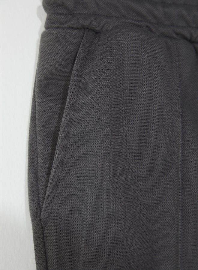 trendyol Regular/Normal Cut Medium Length Textured Elastic Waist Stitching Detail Pique Shorts - Image 5