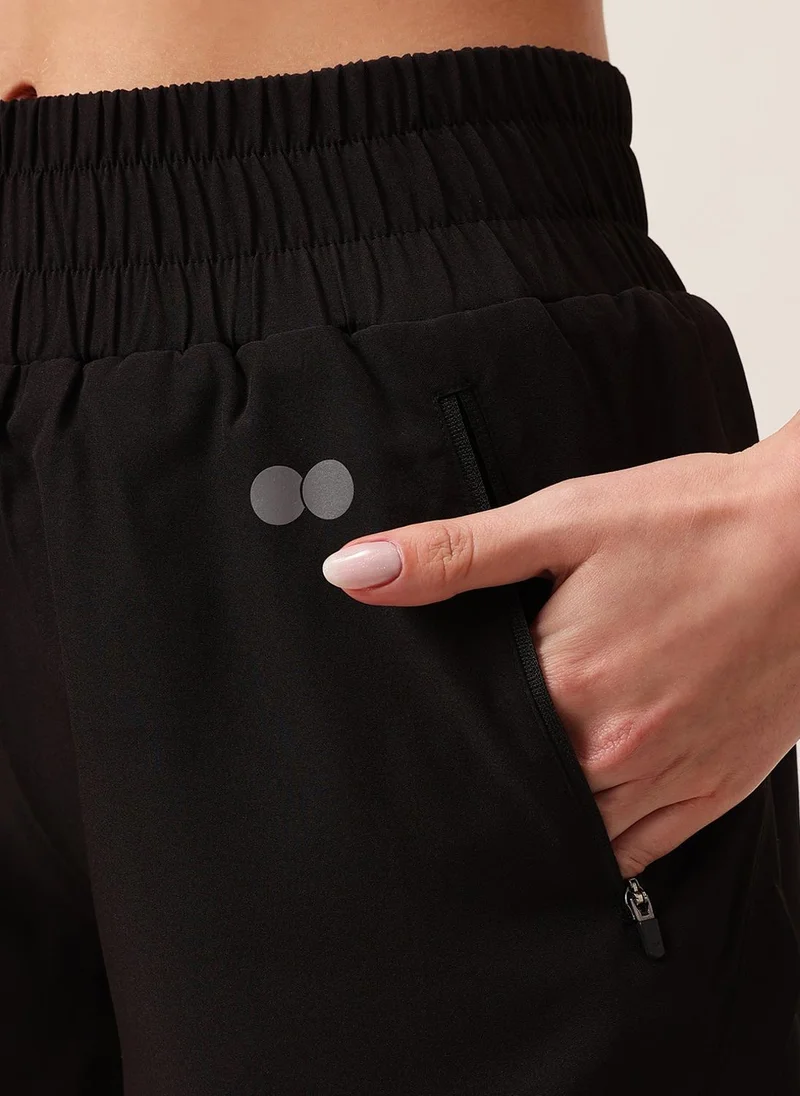 كلوفيا Clovia Snug Fit Active High Rise Running Shorts in Black