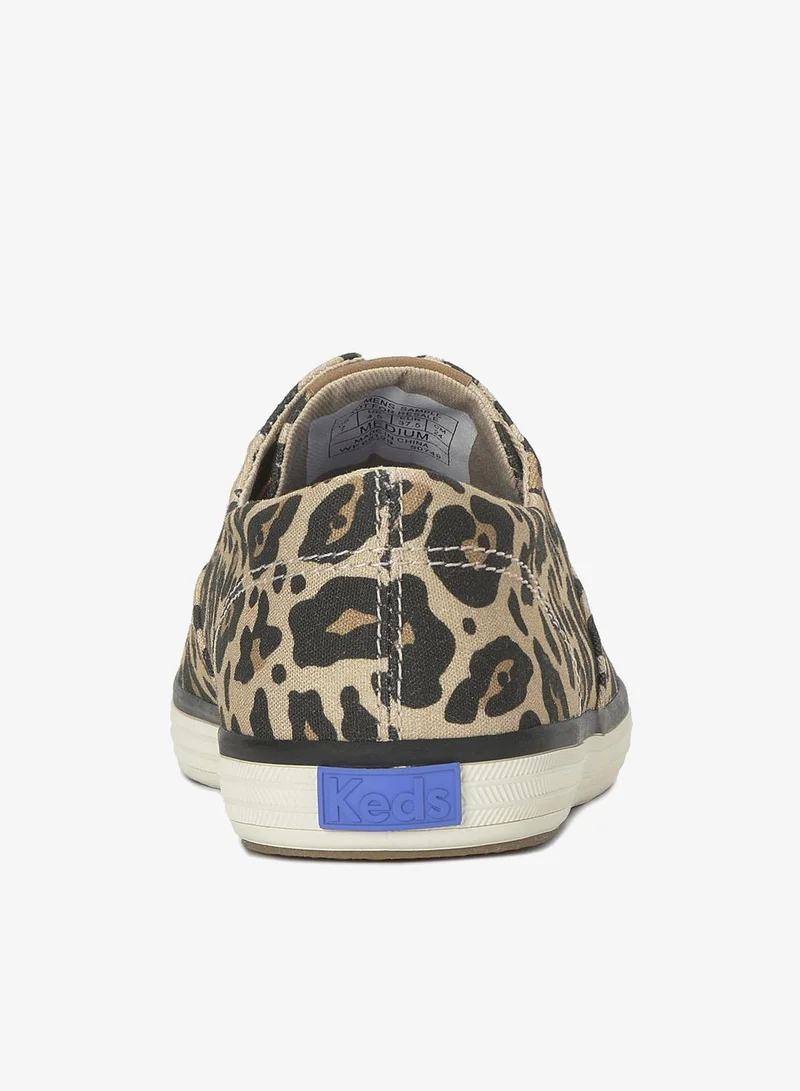 كيدز Keds Women's Champion Canvas Slip-On Sneaker is all-Over Print, Vulcanized Casual Shoe Tan