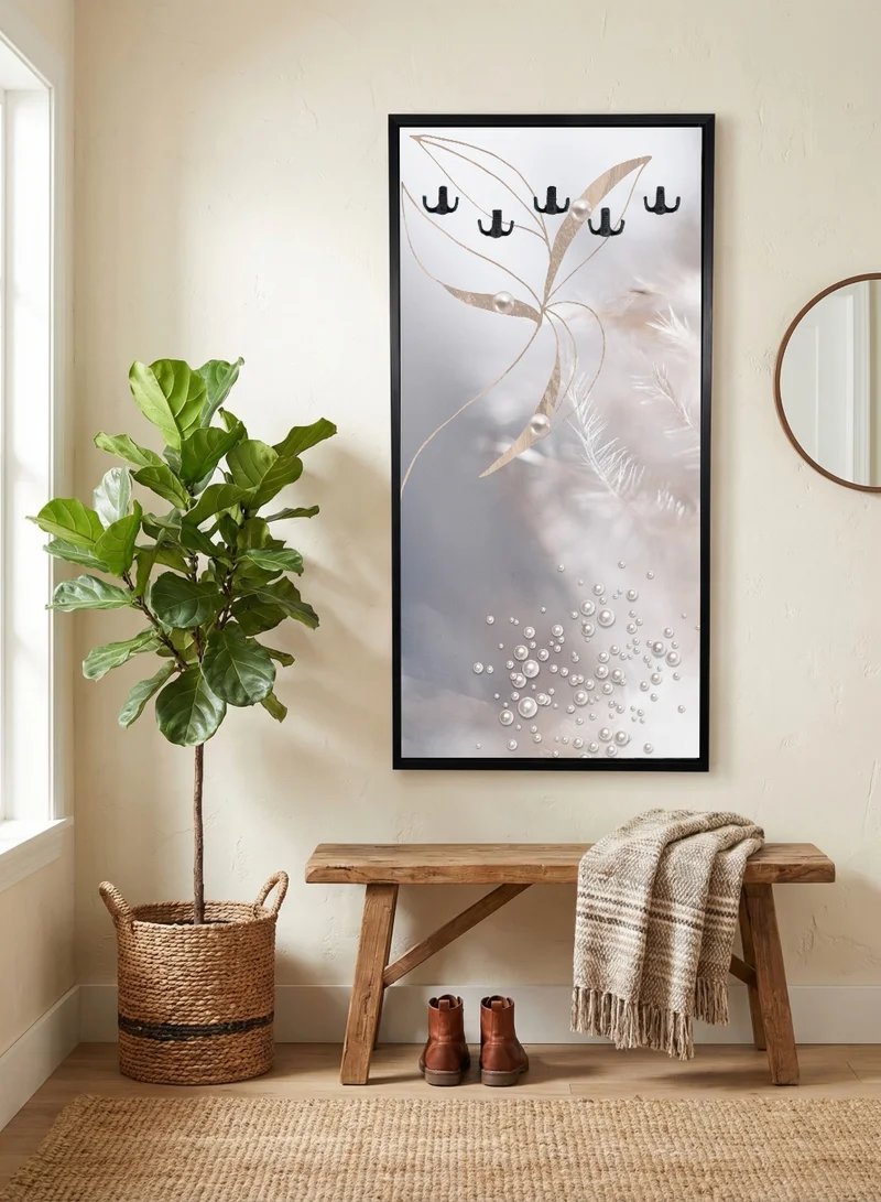 لوحة علاقة ملابس وعبايات مدمجة في لوحة كانفاس بتصميم أوراق نباتية مثبتة على إطار خشبي مع إطار خارجي أسود