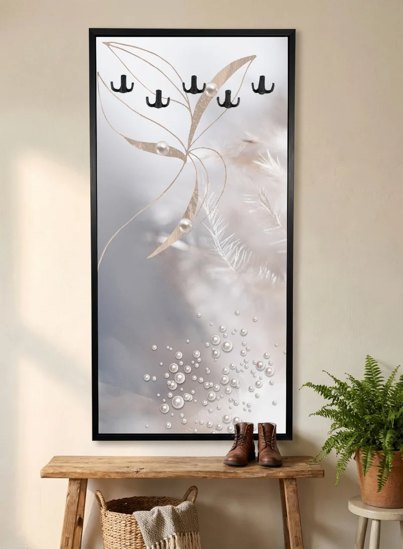 لوحة علاقة ملابس وعبايات مدمجة في لوحة كانفاس بتصميم أوراق نباتية مثبتة على إطار خشبي مع إطار خارجي أسود