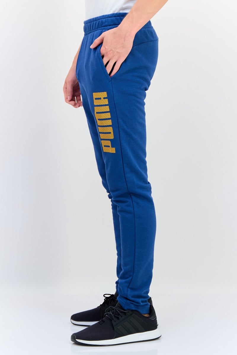 PUMA سروال رياضي للرجال مناسب للجري، أزرق - Image 3