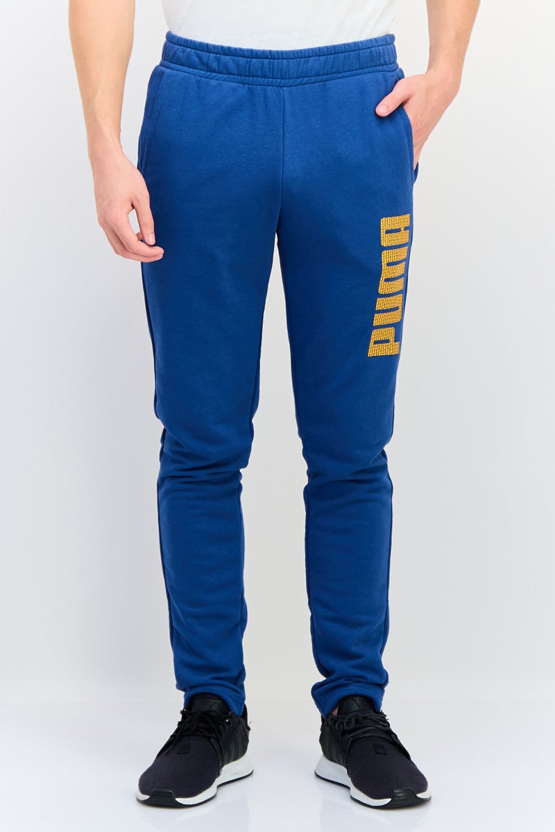 PUMA سروال رياضي للرجال مناسب للجري، أزرق - Image 1