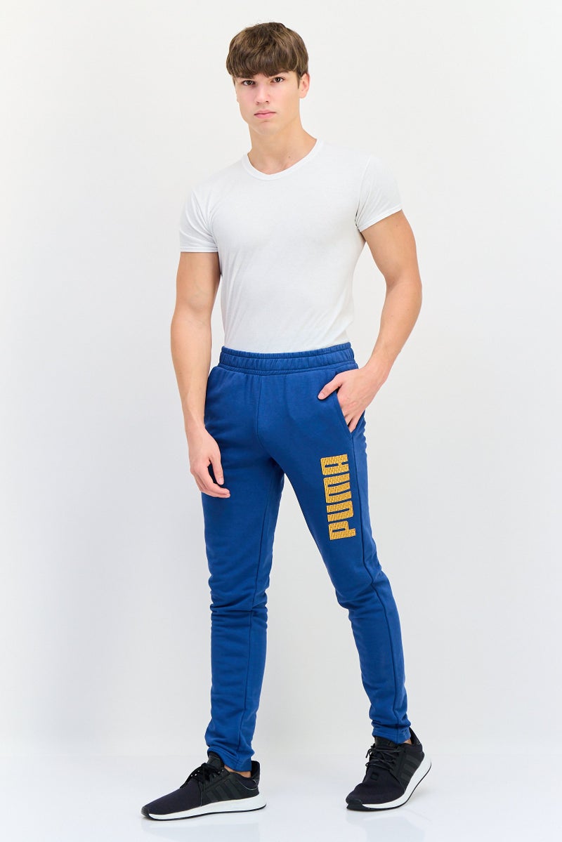 PUMA سروال رياضي للرجال مناسب للجري، أزرق - Image 2