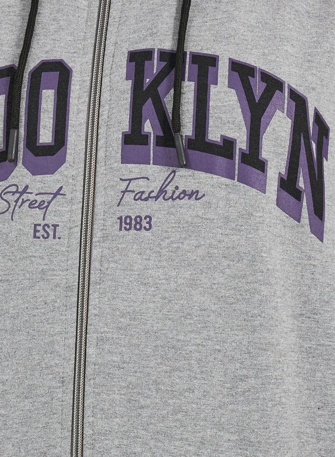 Styli Oversized Longline Zip Through Slogan Hoodie