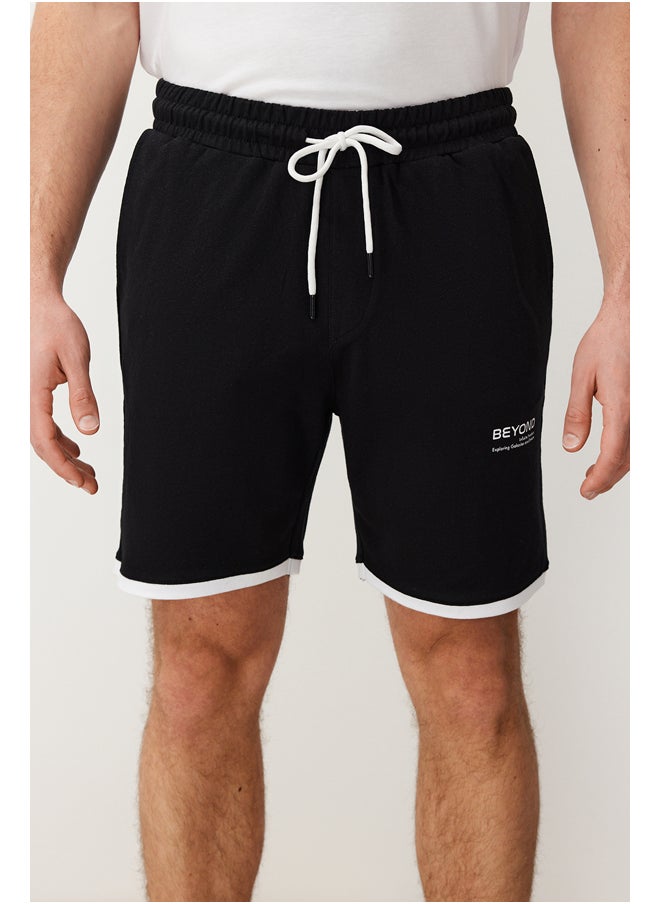 trendyol - Black Regular Cut Letter Printed Drawstring Elastic Waist Shorts TMNSS24SR00040 - Image 1