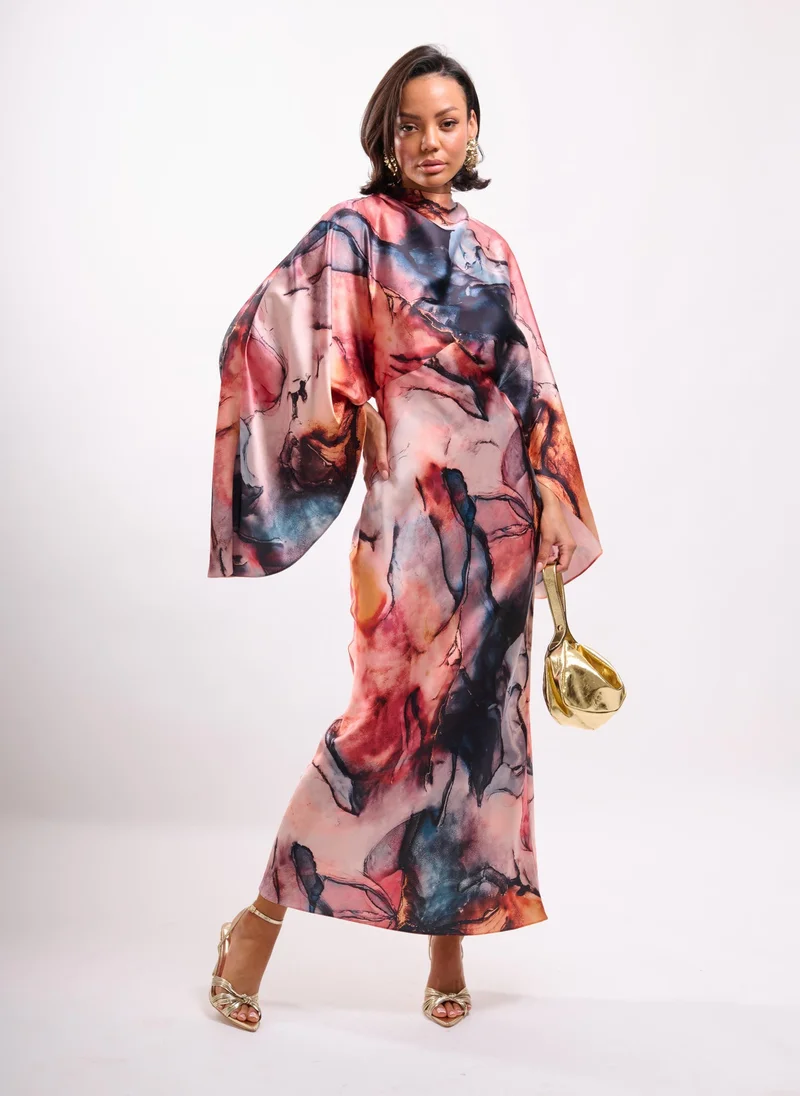 BATWING CAPE MAXI DRESS IN LAUNDERED SATIN IN ABSTRACT PRINT