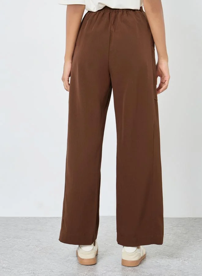 تايك تو بنطال سادة بقصة أرجل واسعة