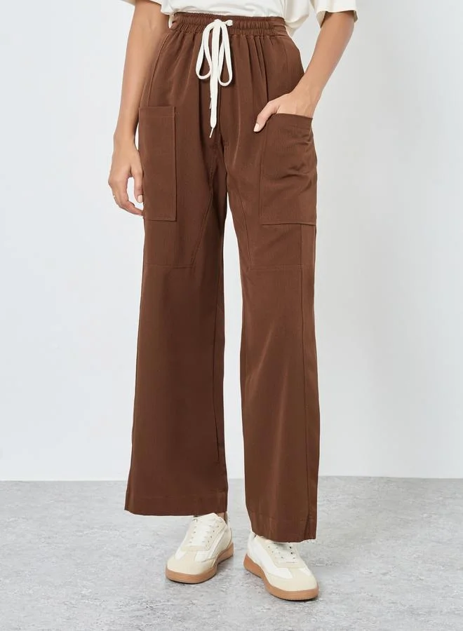 تايك تو بنطال سادة بقصة أرجل واسعة