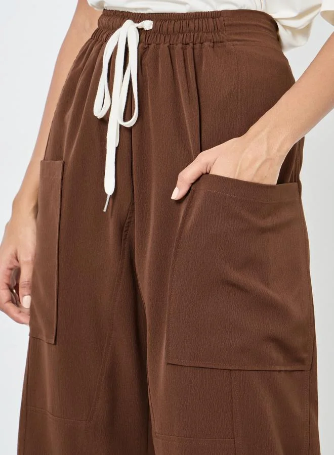 تايك تو بنطال سادة بقصة أرجل واسعة