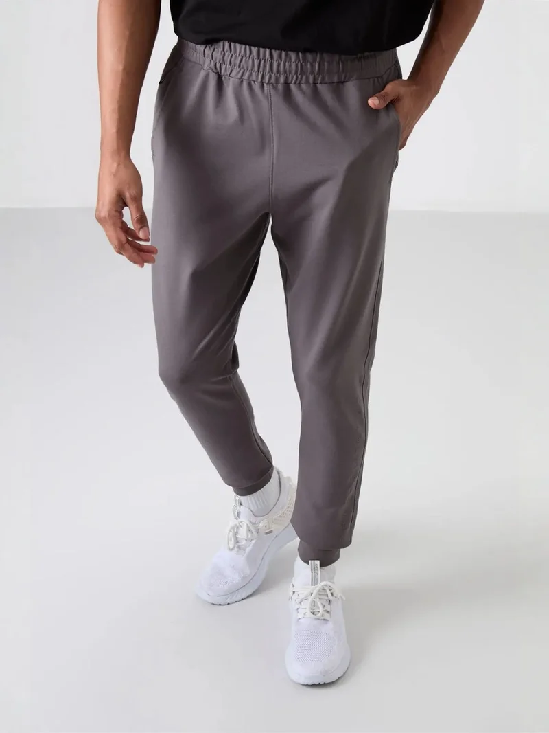 تومي لايف TOMMY Men's Regular Fit Cotton Blend Sweatpants
