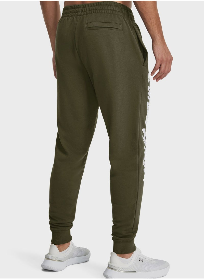 UNDER ARMOUR - Rival Fleece Graphic Joggers - Image 1