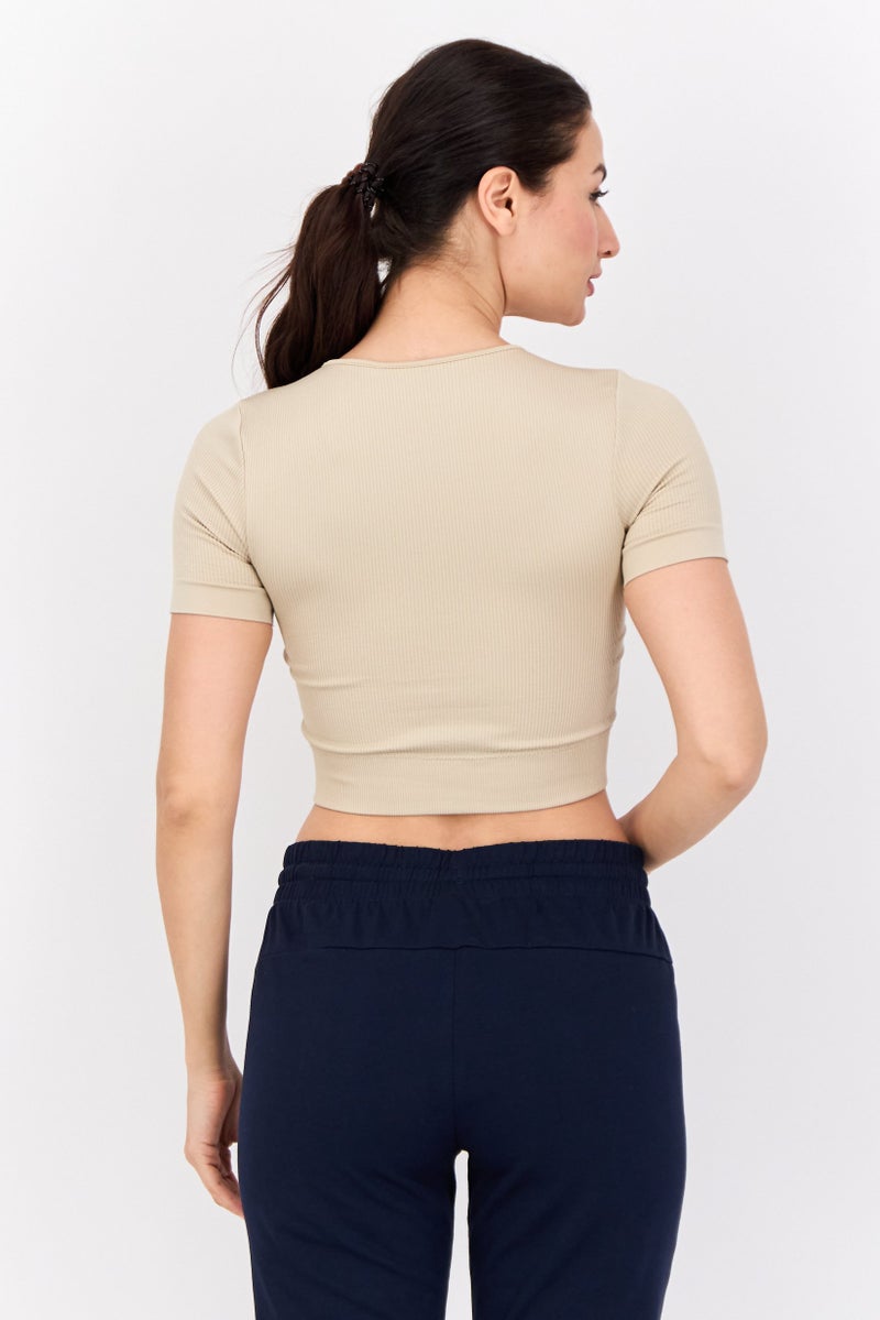 PUMA Women Sportswear Fit Short Sleeve Outdoor Top, Beige - Image 3