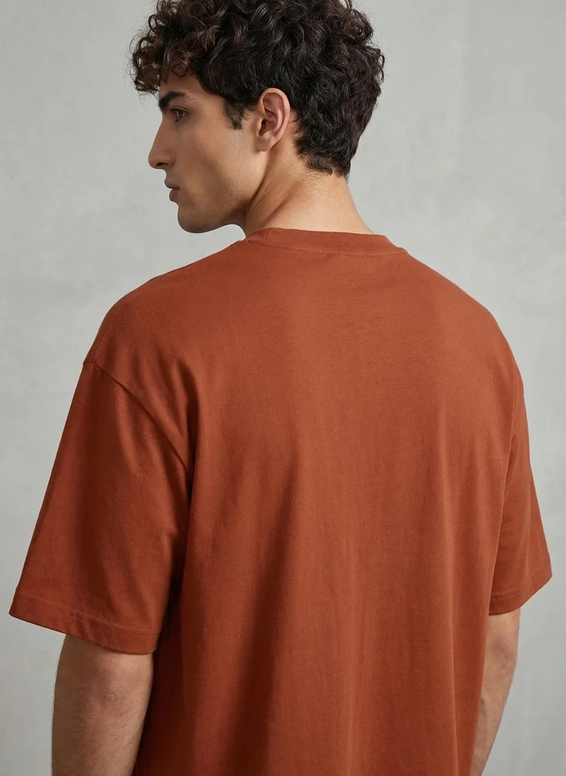 NOBERO Rust Orange Men Oversized Printed T-shirt for Men | Best Price UAE