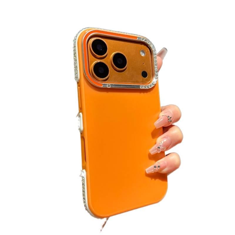 MS غطاء واقي بسيليكون لـ iPhone 16 / 16 Plus / 16 Pro / 16 Pro Max مع إطار عدسة ماسي ومرآة مكياج على شكل قلب مع مقاوم للصدمات مع حامل قائم مع حماية من السقوط باللون برتقالي بوظيفة حا. - Image 1