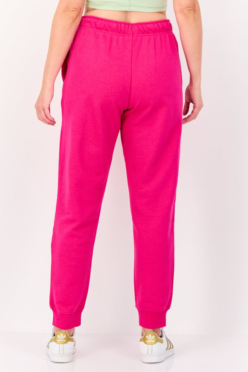 Nike Women Standard Fit Embroidered Logo Outdoor Sweatpants, Fuchsia - Image 2