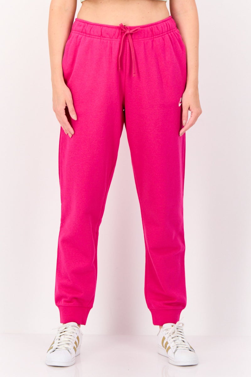 Nike Women Standard Fit Embroidered Logo Outdoor Sweatpants, Fuchsia - Image 1