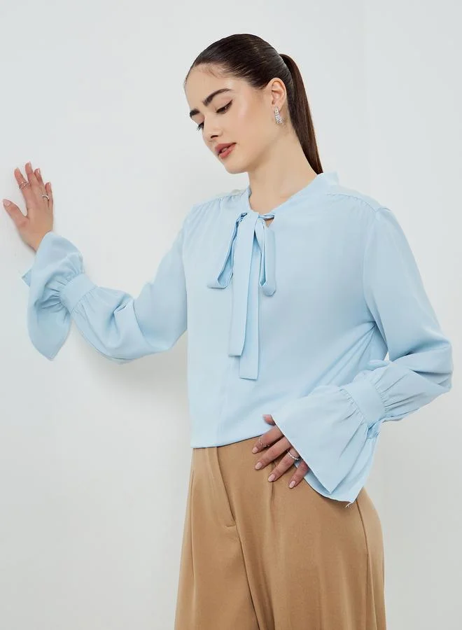 Styli Blue Tie-Up Neck Long Sleeve Blouse