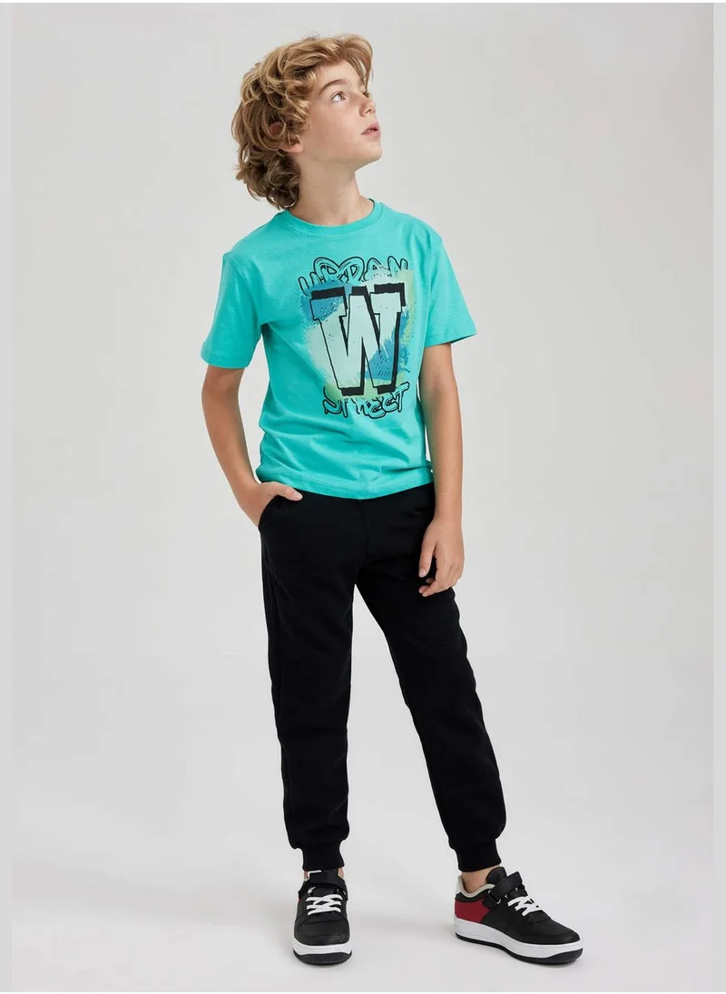 ديفاكتو Rib Hem Slim Fit Trousers