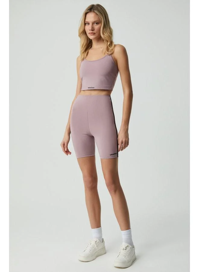 PHARSA Women’s Soft-Touch Rosewood Shorts with Tape Trim.