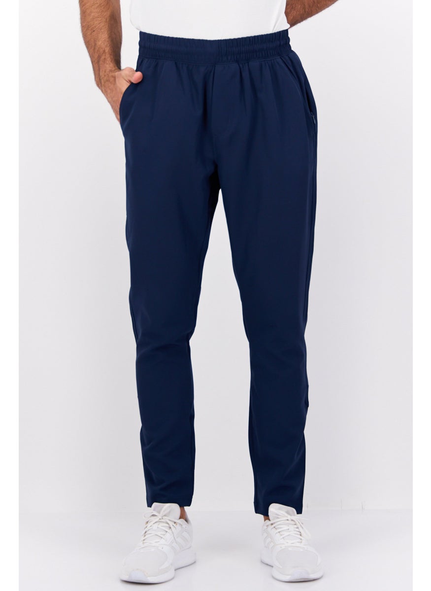 Men Slim Fit Solid Sweatpants, Navy Blue - pzsku/Z743C045136E93C17442DZ/45/_/1737643044/574a3ab9-9776-4809-baaa-667153a6eaf9