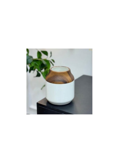 An elegant ceramic vase with a modern touch to add a touch of vitality to your home decor, made with an attractive finish that makes it look more charming with the beautiful artificial flower arrangement, made of high-quality materials, to enhance the beauty of your decor