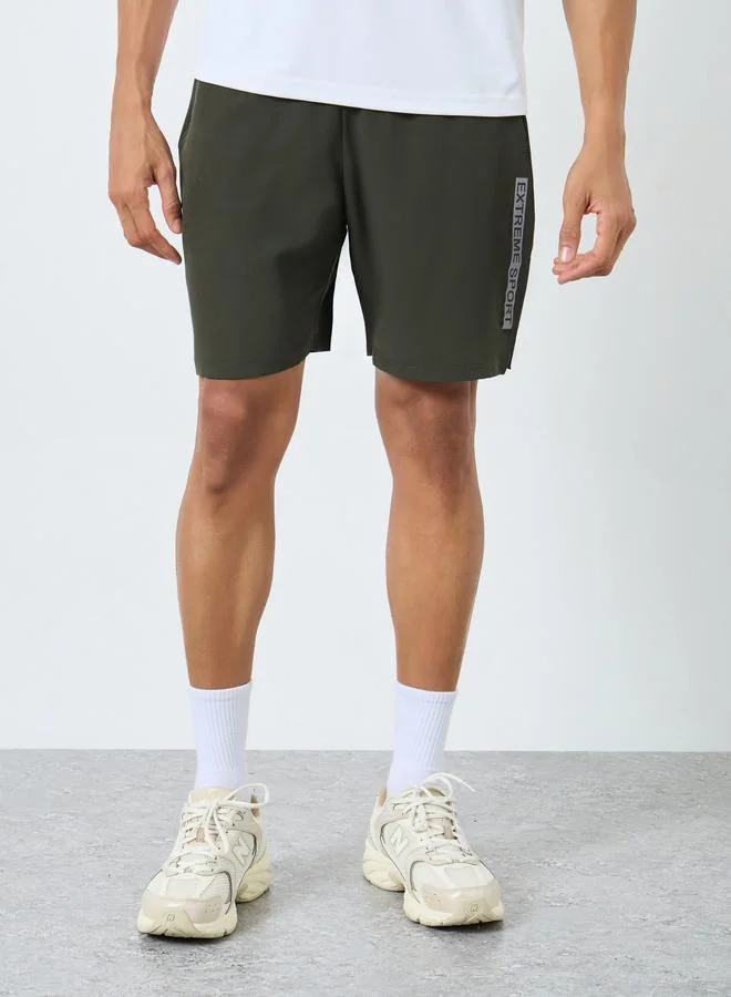 Styli Active Men Olive Workout Shorts with Side Print Detail