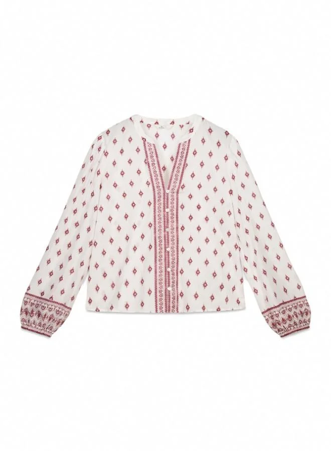 Springfield  Printed voluminous long sleeve shirt. Round neck with V-neck opening. Front buttons. Elasticated cuffs. This garment is made from 100% sustainable cotton. for Women | Best Price UAE