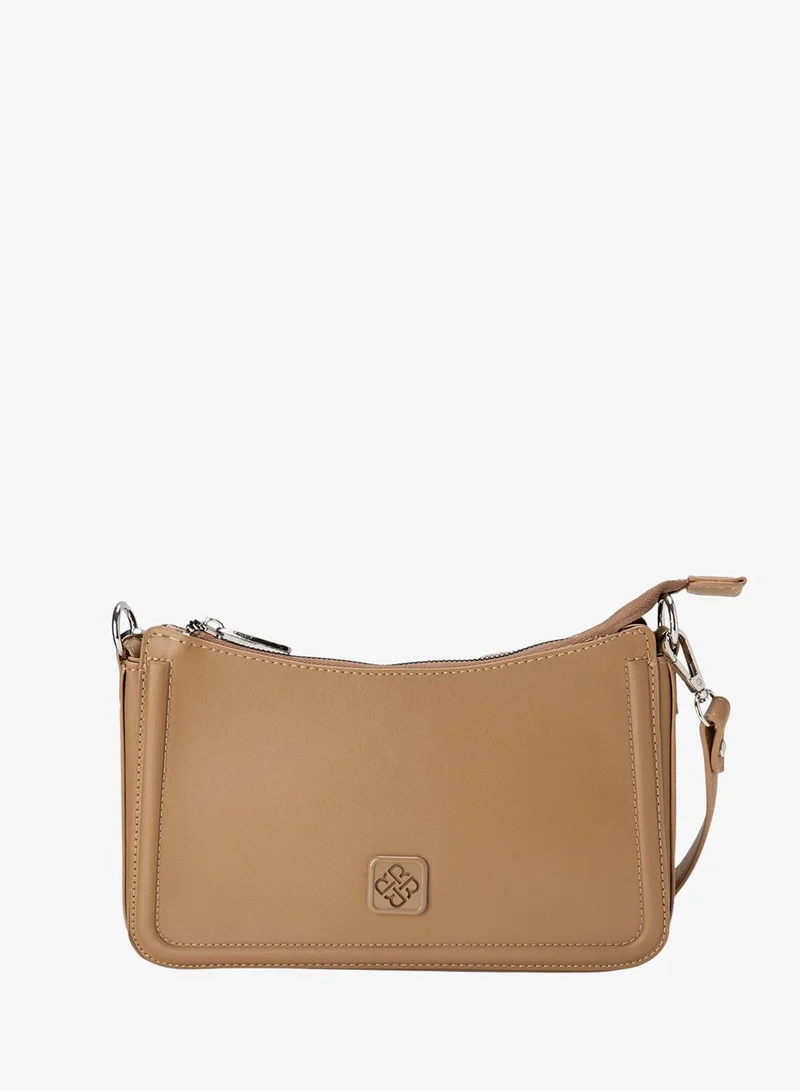 باتا حقيبة سلك منقوشة باللون البيج