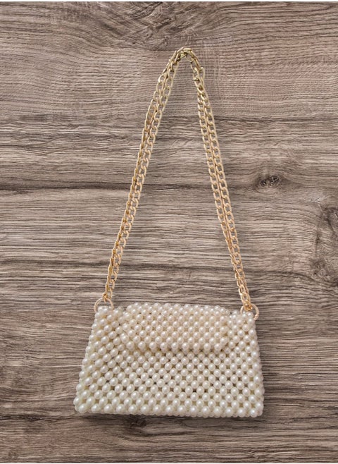 Crossbody bag for women, handmade from luxurious beads, suitable for parties, outings and multiple uses, size 22 cm * 14 cm, internal space sufficient for up to 3 mobile phones, available in distinctive colors (black - red - beige - multiple colors)