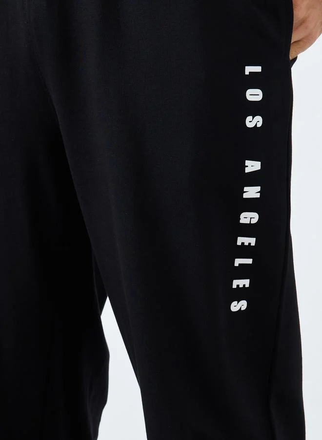 Styli Styli Relaxed Fit Slogan Print Joggers