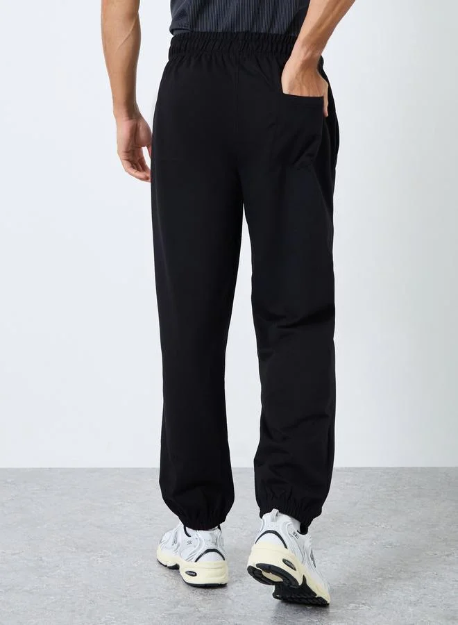 Styli Styli Relaxed Fit Slogan Print Joggers