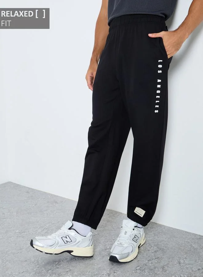Styli Styli Relaxed Fit Slogan Print Joggers