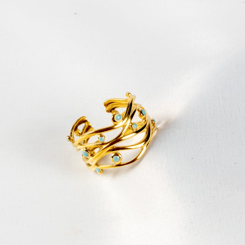 ذا بلاك بيرل اكسسوريز خاتم أستانليس ستيل ذهبي فري سايز مرصع بالمينا الزرقاء - Image 1