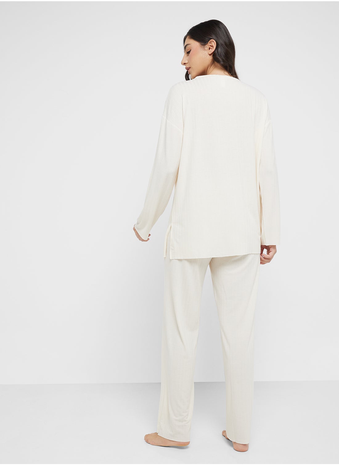 Ribbed T-Shirt & Pyjama Lounge Set - https://f.nooncdn.com/p/pzsku/Z746A9509FD91924F1089Z/45/_/1737356480/b9f78321-b0c8-4185-994a-0dbb5d033e8f.jpg?format=jpg&width=original
