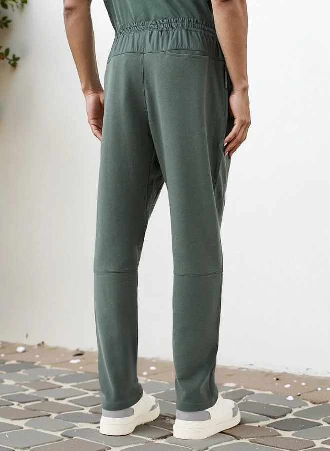 Kappa  Kappa Logo Detail Pants with Drawstring Closure and Pockets for Men | Best Price UAE