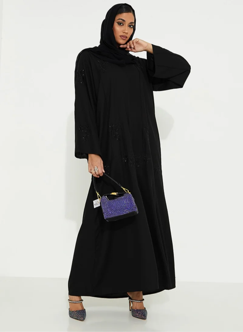 Rosette Abaya Embellished open abaya with hand embroidery &amp; wide sleeve