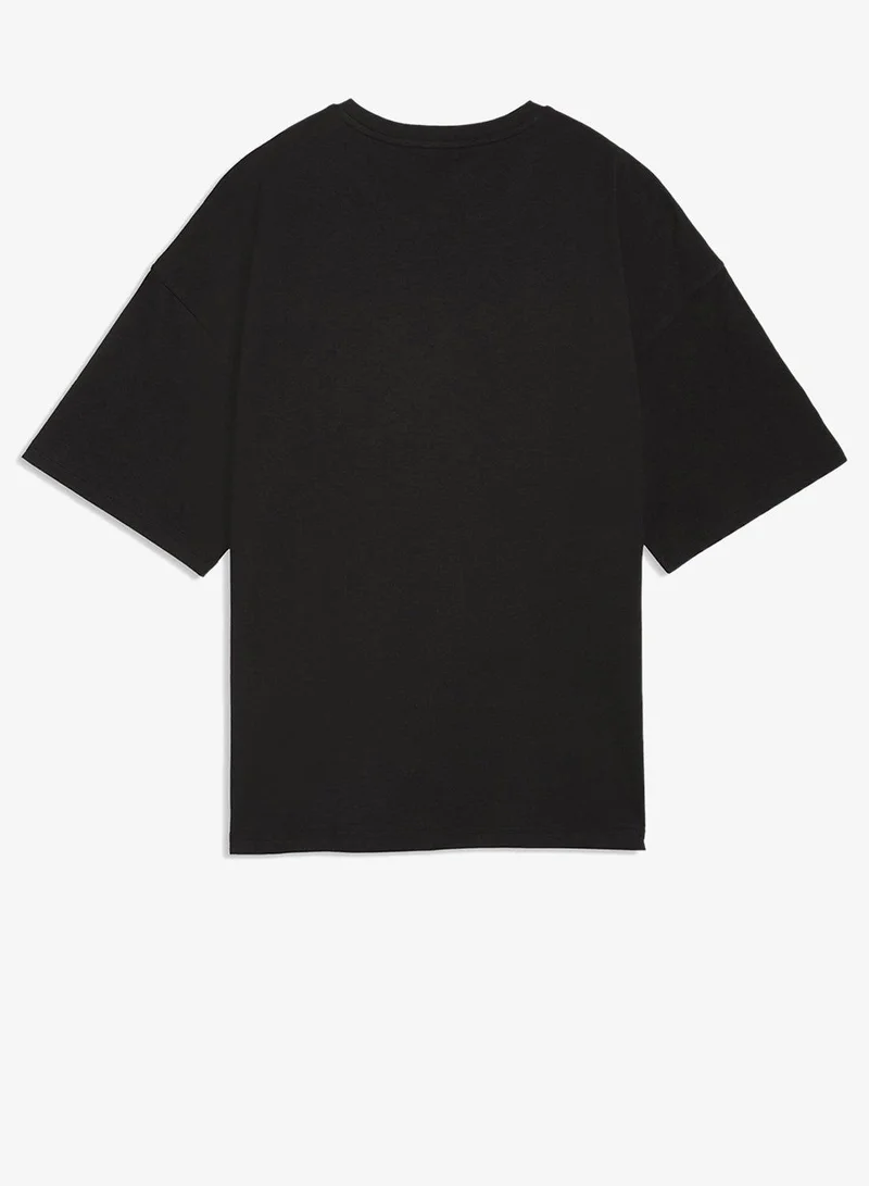 بوما تيشيرت ليون لوكس كبير الحجم برسومات أساسية