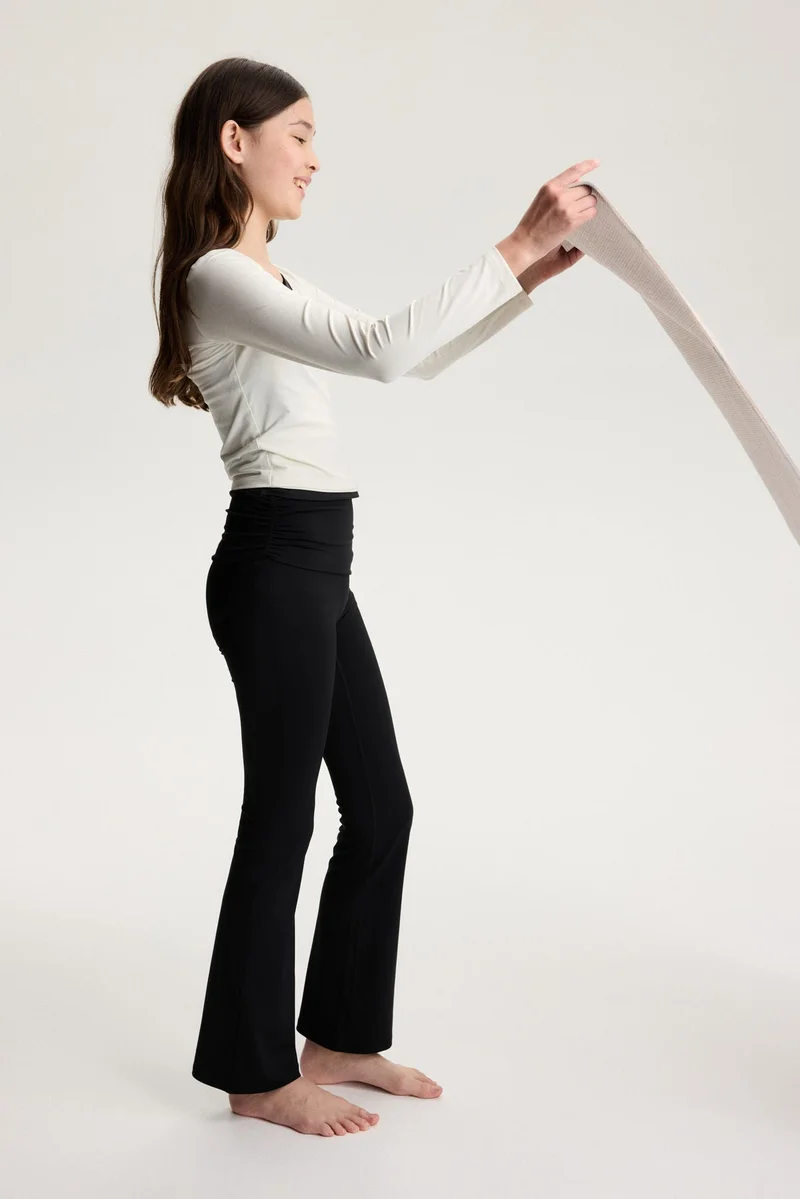 H&M Flared sports leggings with SoftMove™