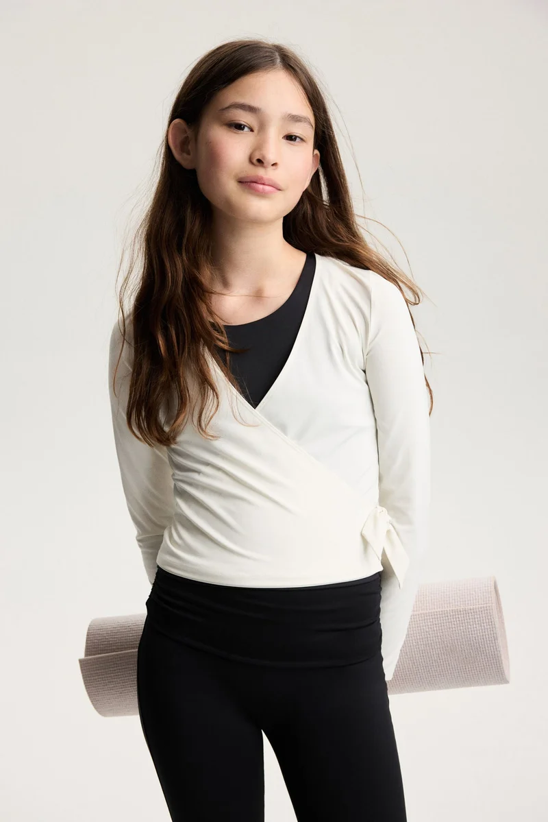 H&M Flared sports leggings with SoftMove™