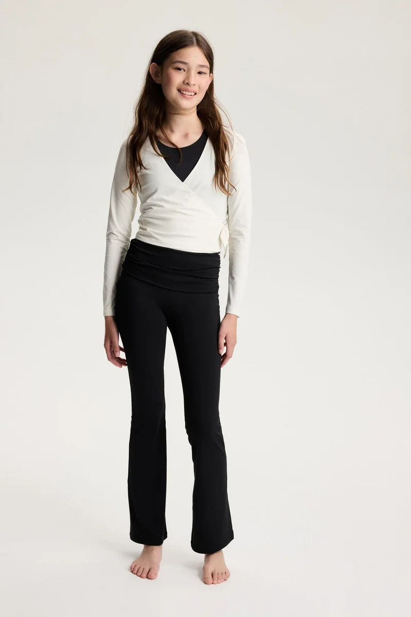 H&M Flared sports leggings with SoftMove™