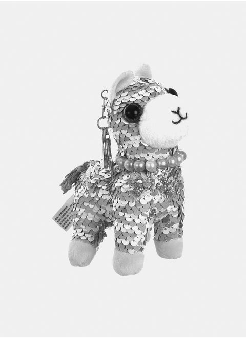 A medal in the shape of a dog with sequins
