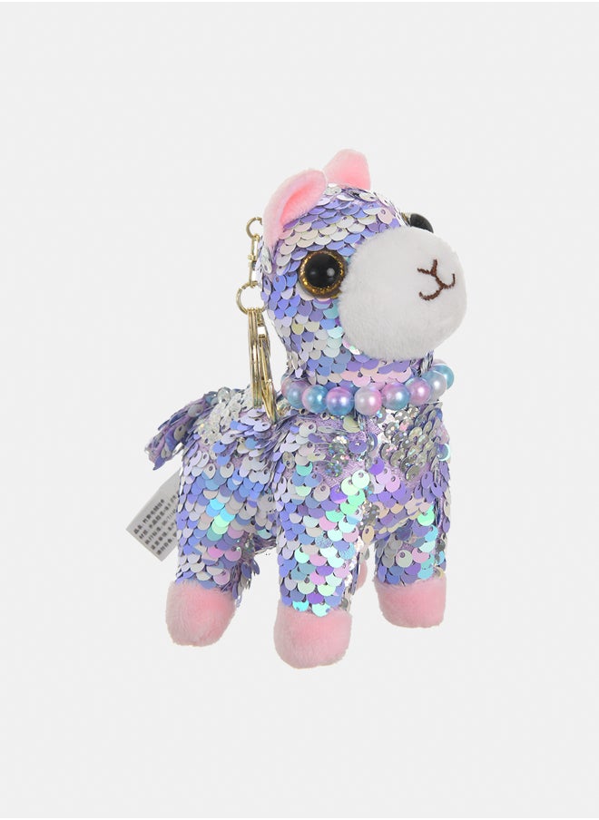 A medal in the shape of a dog with sequins