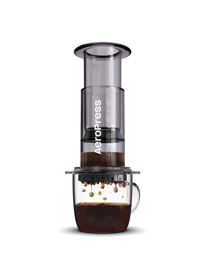 AeroPress آلة ضغط القهوة أيرو بريس باللون الأسود - طريقة تحضير 3 في 1 تجمع بين الضغط الفرنسي، الإسبريسو، والقهوة الكاملة بدون رمال أو مرارة، صانعة قهوة صغيرة محمولة للتخييم والسفر، باللون الأسود - Image 1