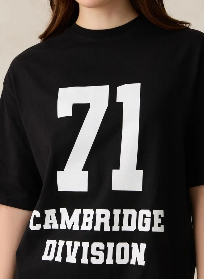 OUTZIDR Black Varsity Graphic T-Shirt Mini Dress