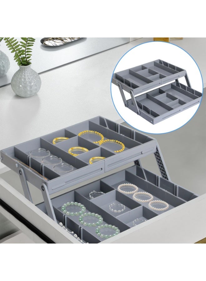 Smart multi-level drawer organizer with a flat, foldable, two-tier design; expandable and adjustable for office supplies, makeup, cosmetics, and jewelry. - Image 1