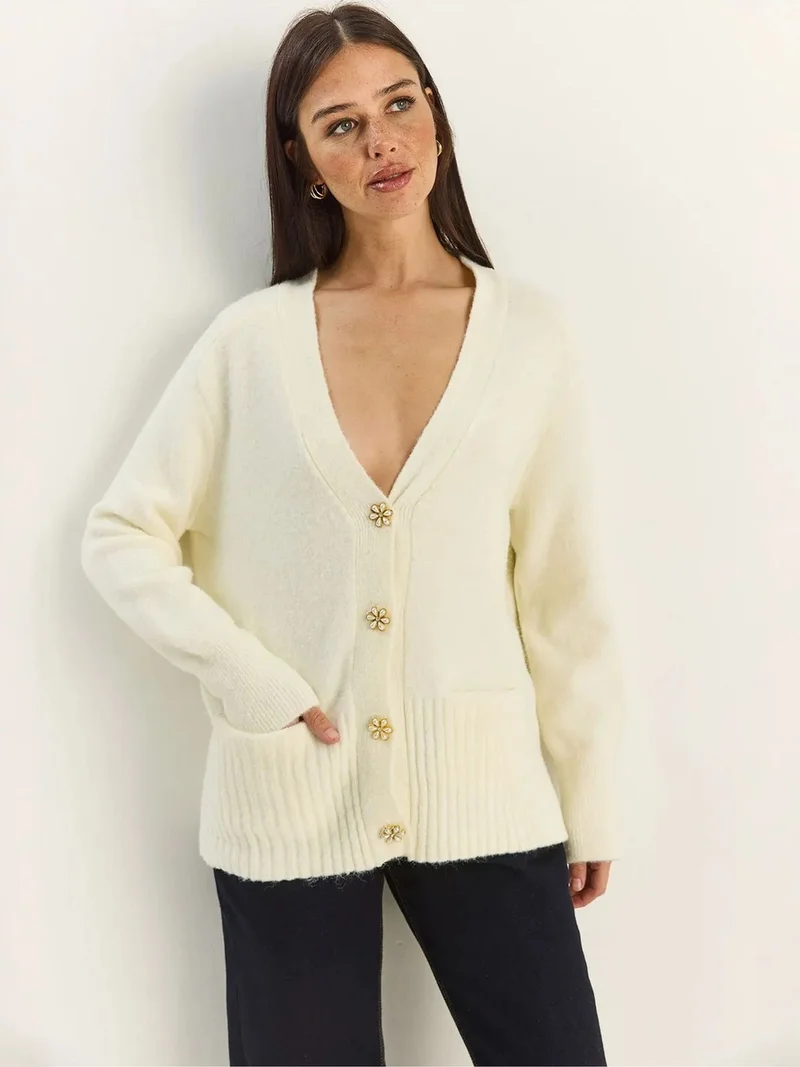 بيانكو لوتشي LUCCI Button Detailed V-Neck Cardigan
