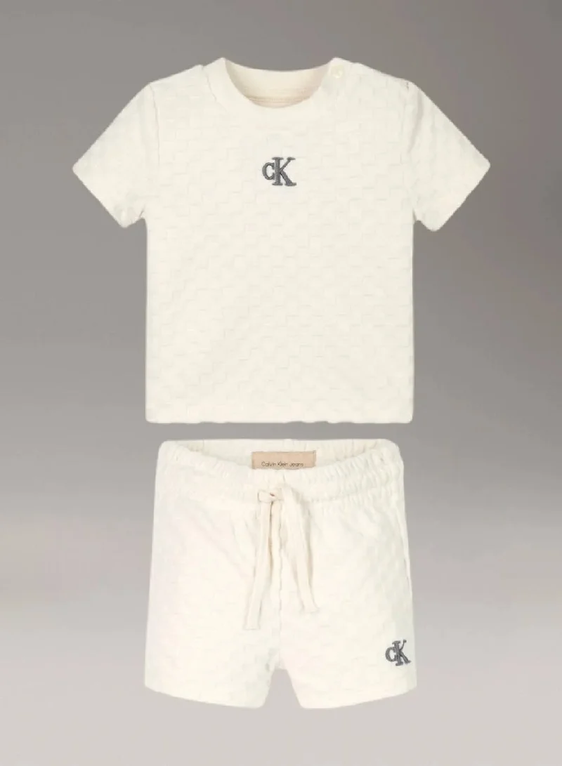 كالفن كلاين جينز طقم ملابس للأطفال حديثي الولادة من قطعتين