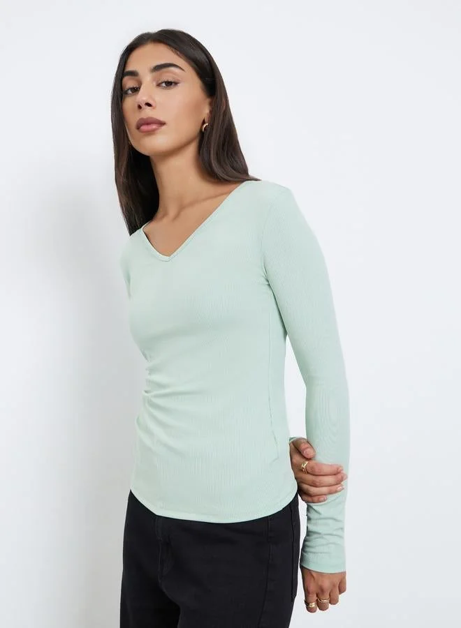 ستايلي بلوزة مضلعة بأكمام طويلة